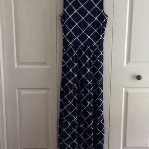 Navy Sun Dress with white designs sleeveless, maxi, ruffle at the bottom